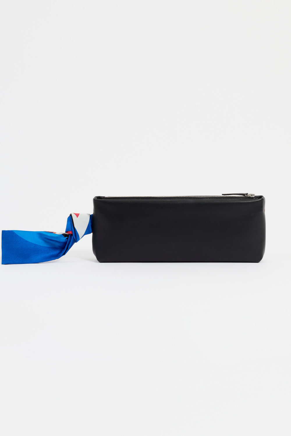 Front view of AYT Studio x REMED 'FOULARD' Baguette, made of smooth black Italian leather with vibrant printed silk foulard handle, limited edition