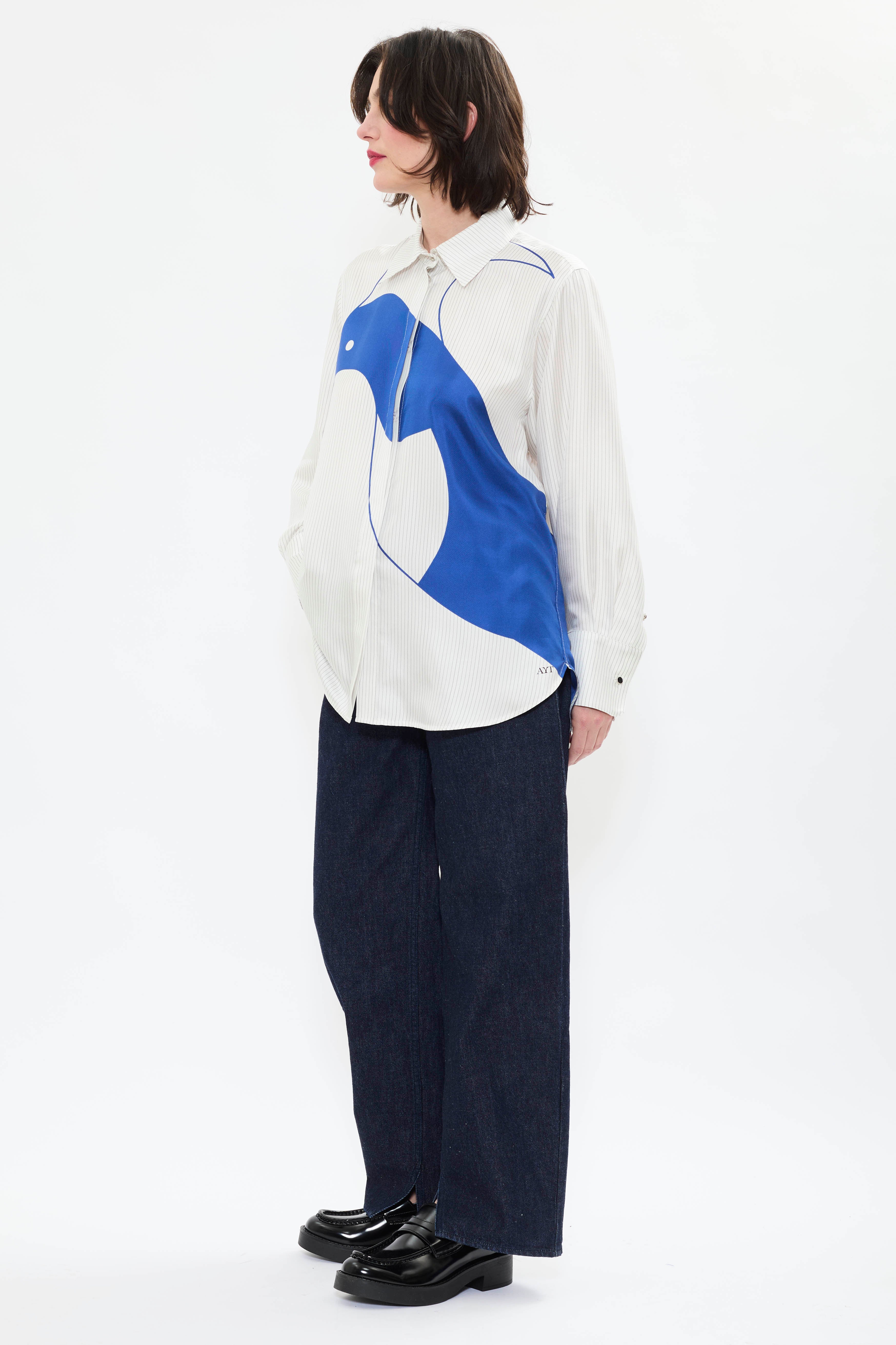 Side view of AYT STUDIO x REMED lightweight 100% Italian silk pinstripe shirt with an artistic design inspired by the painting 'Three Birds. The Blue.'