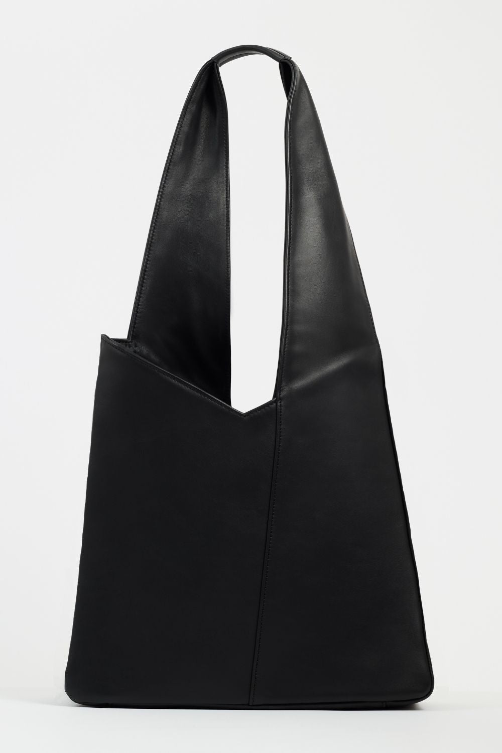 Front view of AYT Studio 'FOULARD' tote bag made of black Italian leather and lining with zipped interior pocket, metal key hook, and  handle with sophisticated scarf detail