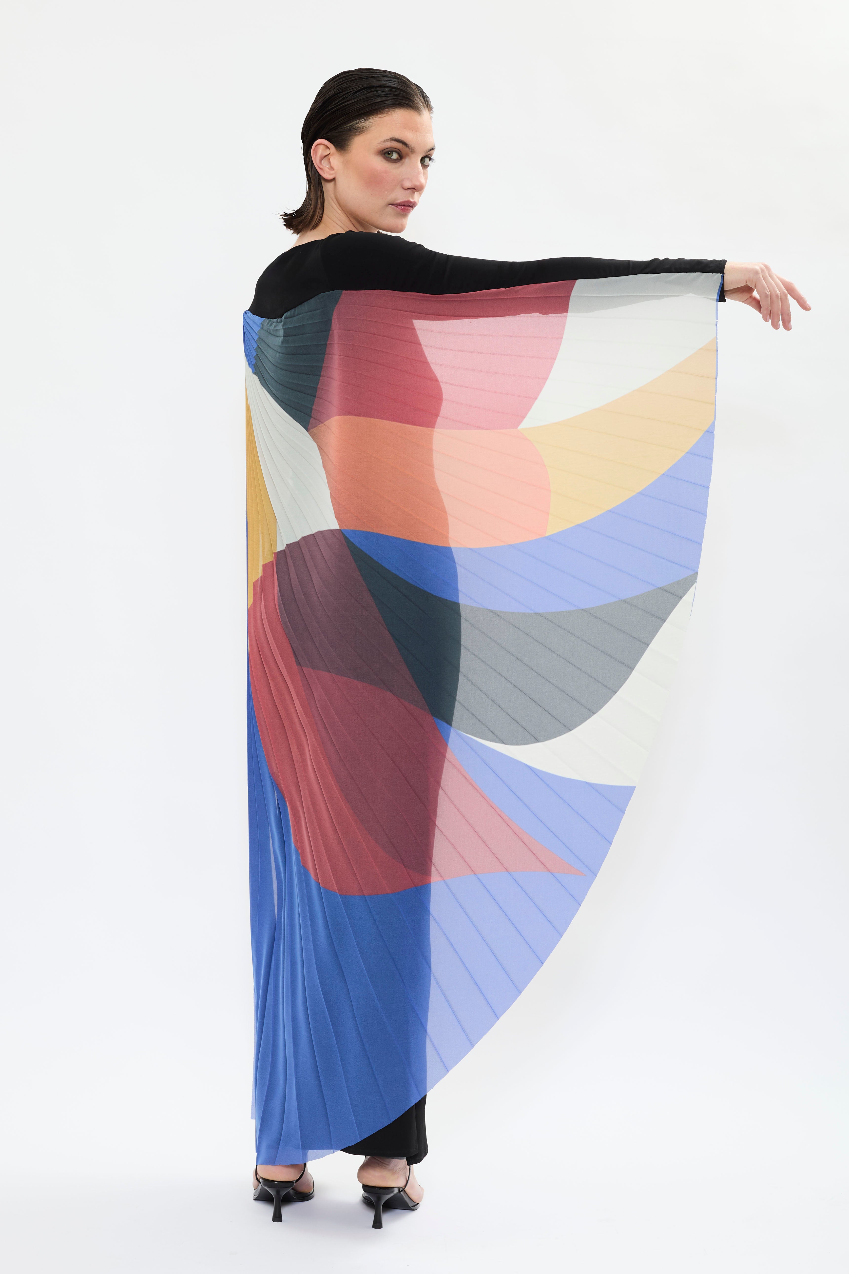 AYT STUDIO x French painter REMED 'ENVOL' long, maxi dress in a fluid jersey fabric with asymmetrical single sleeve, pleated, sculptural graphic patterned panel. Inspired by the painting 'Bel Envol.'