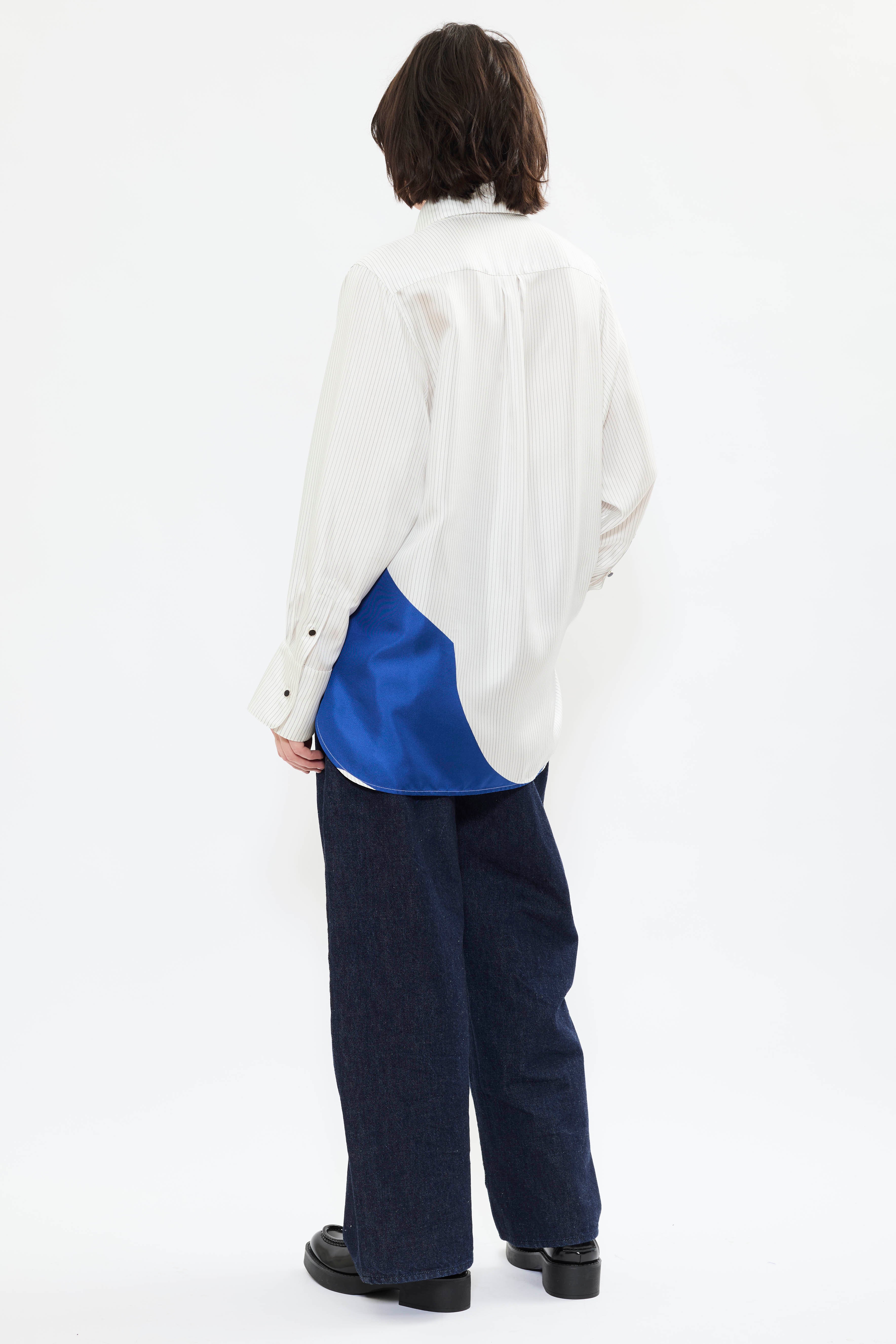 Rear view of AYT STUDIO x REMED lightweight 100% Italian silk pinstripe shirt with an artistic design inspired by the painting 'Three Birds. The Blue.'