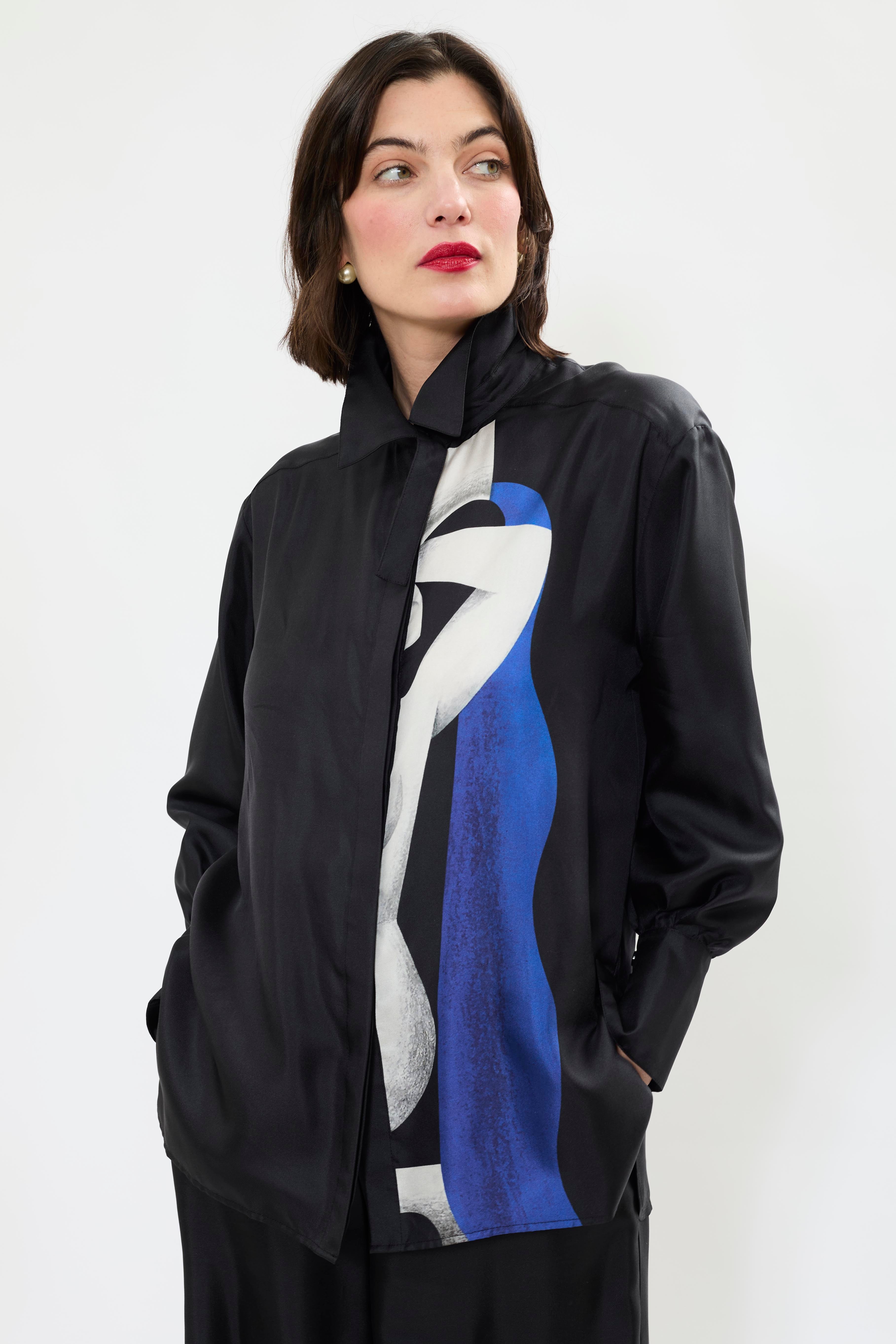 Front view of AYT STUDIO x REMED lightweight black 100% silk shirt with an artistic design inspired by the painting 'Temperance' with broken collar and wide tightened cuff.